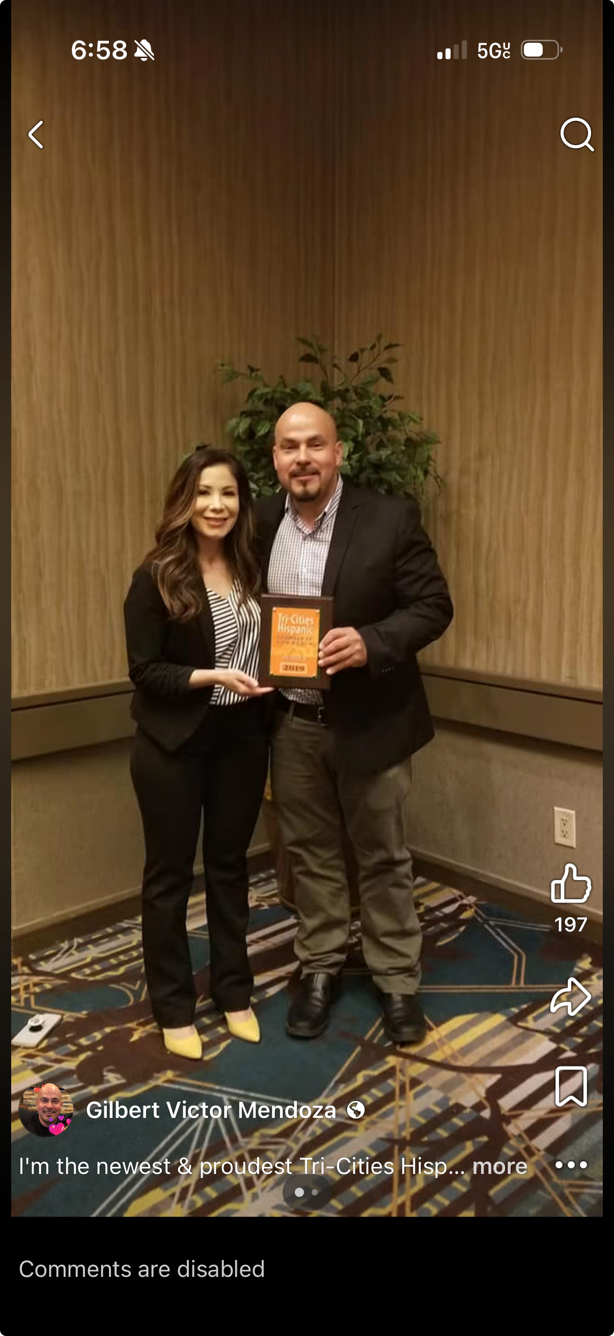 2019 photo: Nikki Torres with donor Gilbert Mendoza at a Tri-Cities Hispanic Chamber event